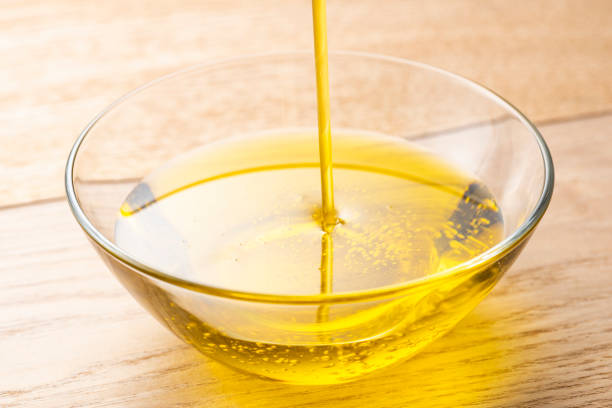 istock Pour olive oil into the bowl 1143659052