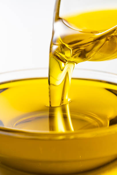 istock Pour olive oil into the bowl 1143659068