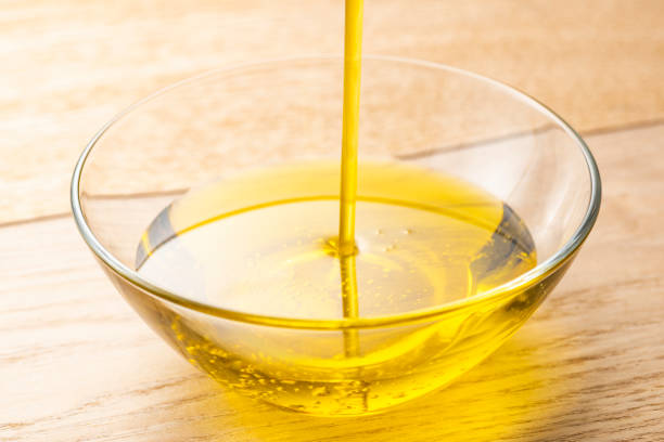 istock Pour olive oil into the bowl 1143659118