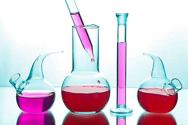 istock laboratory glassware with colorful chemicals 114366380
