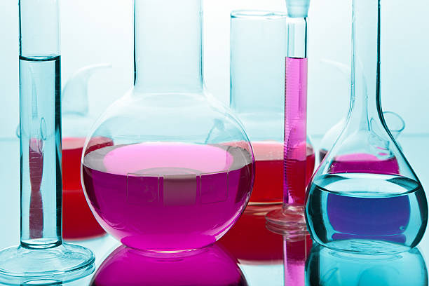istock laboratory glassware with colorful chemicals 114366409