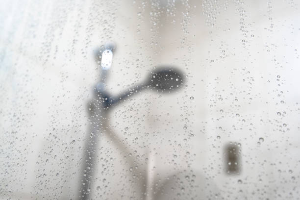 istock Close-up Drops on Surface of Shower Cabin as Background blurred Image 1143664755