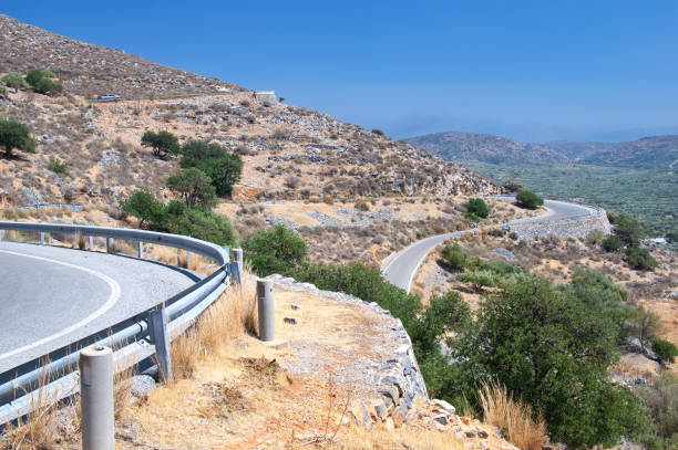 istock Winding road in mountains of Crete island, Greece 1143679430
