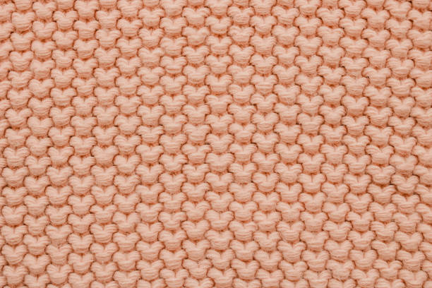 istock Texture of pink big wool knit. Top view. 1143679464