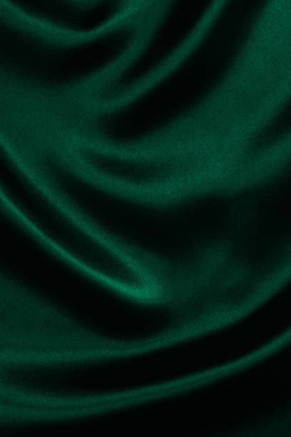 Emerald green satin background stock photo