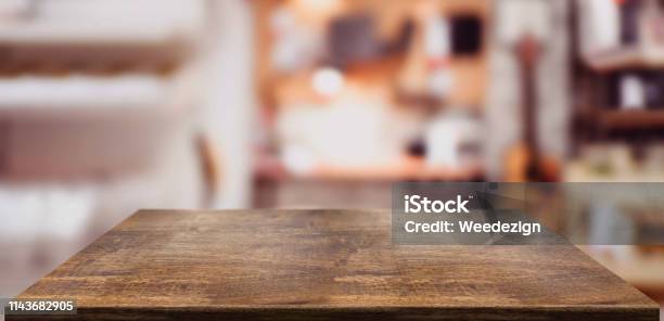 Perspective Wood Table Counter In Home Officeempty Wooden Tabletop With Blurred Music Workplace Backgroundmock Up Template For Display Or Montage Of Your Designbanner For Advertise Of Product Stock Photo - Download Image Now