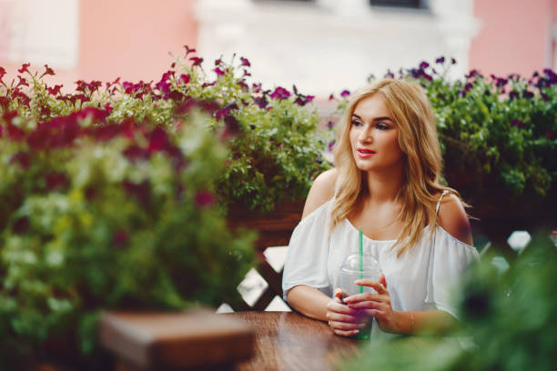 istock stylish blonde in a city 1143684302