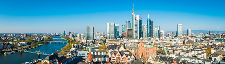 Frankfurt, Germany - January 17, 2017: Skyline of Frankfurt with main road and skyscrapers in late afternoon.