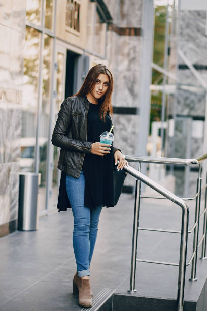 istock girl with phone 1143686837