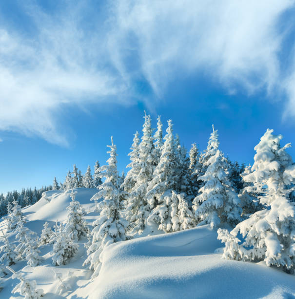 istock Snowdrifts on winter snow covered mountainside 1143687061