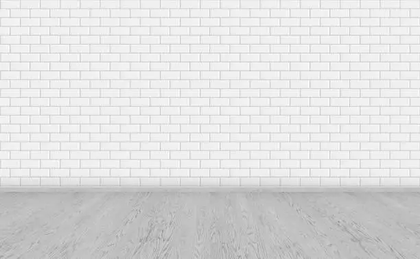 Photo of Empty room with grey wooden floor and classic white metro tiles wall. Long wide picture of empty living space room for design interior..