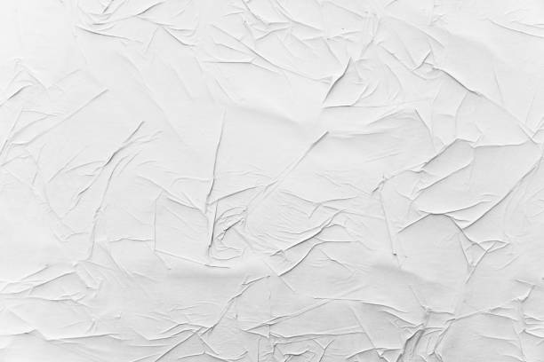 istock Crumpled creased posters grunge paper textures. 1143688575