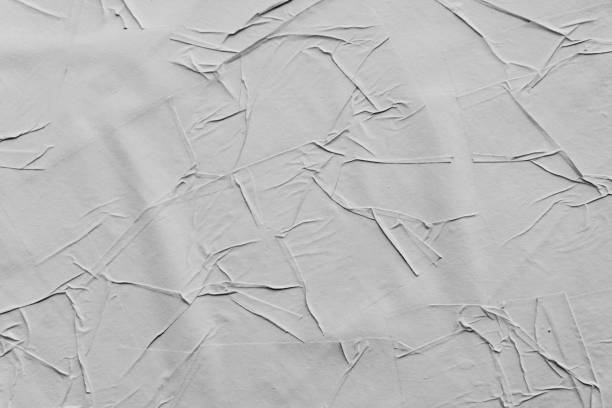 istock Crumpled creased posters grunge paper textures. 1143688755
