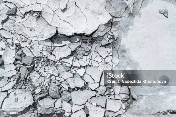 Grey Pattern Or Textured Background With Cracked Concrete Stock Photo - Download Image Now