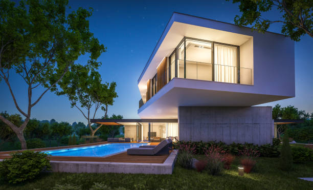istock 3d rendering of modern house on the hill with pool in night 1143691292
