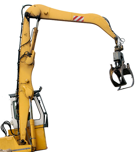 Grab loader isolated on white Detail view of grab loader isolated on white background with clipping path. crane construction machinery stock pictures, royalty-free photos & images