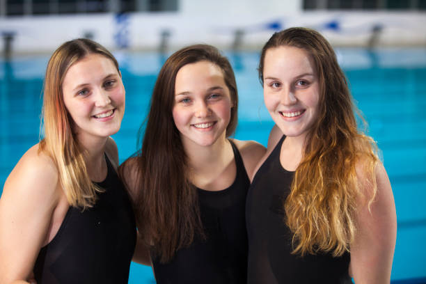 istock Young female swimmers team portrait 1143693190