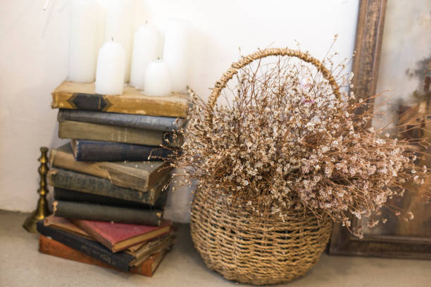 istock Old books and dry flower 1143695985