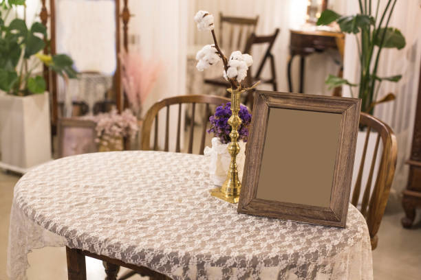 istock Vintage photo frame on wooden table 1143696180