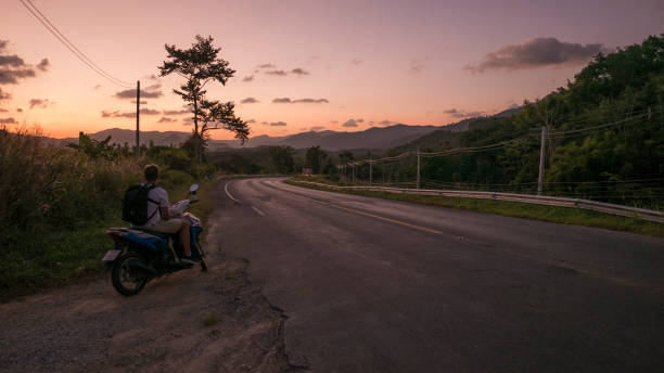 istock Motorcycle trip in tropical climate 1143696395