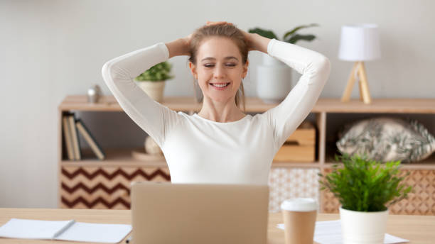 istock Woman relaxing after finished computer work, looking at screen 1143696578