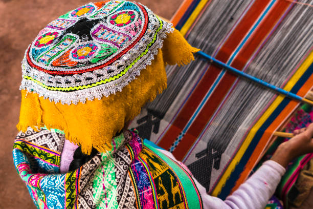istock Inca woman weaving alpaca wool 1143698242