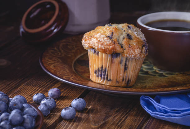 istock Blue Berry Muffin and Cup of Coffee 1143699742