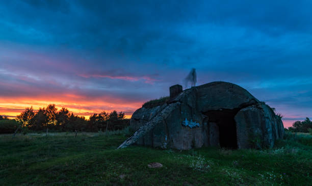 istock Rural landscape at sunset. Old bunker 1143700781