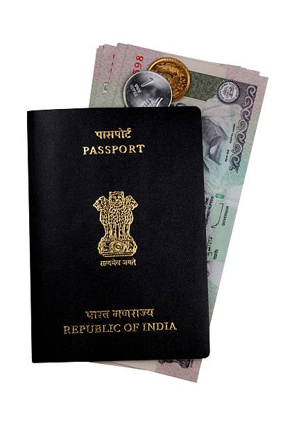istock Indian Currency Rupee Notes, Coins and Passport 114370126