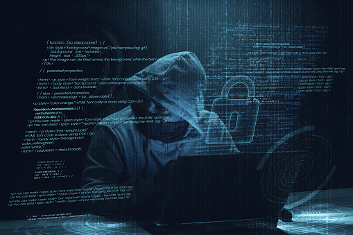 Internet crime concept. Hacker working on a code on dark digital background