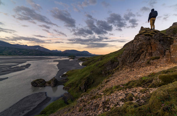 istock Icelandic nature. Admiring mountains with moss and black volcanic rocks 1143703452