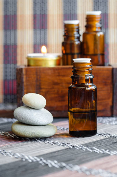 istock Small bottles with essential oil. Aromatherapy, spa and herbal medicine concept. Copy space. 1143713219