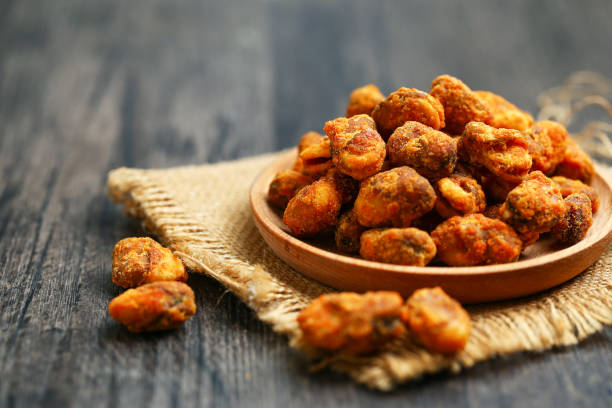 istock fried broad beans with curry salt in a plate close up on a table 1143715042