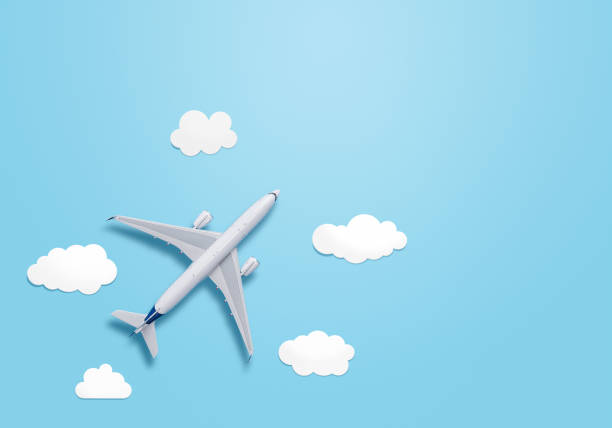 istock Small airplane model on the blue background 1143715720