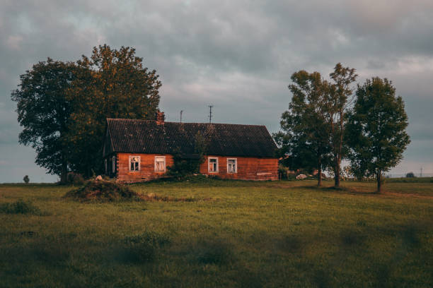 istock Old wooden hut. Rural landscape 1143715736