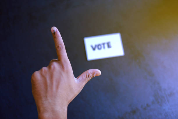 istock Indian Voter Hand with voting sign 1143716311