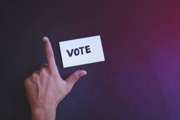 istock Indian Voter Hand with voting sign 1143716315