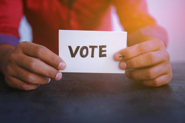 istock Indian Voter Hand with voting sign 1143716636