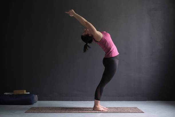 istock Woman practice duing sun solutation. Yoga concept. 1143716886