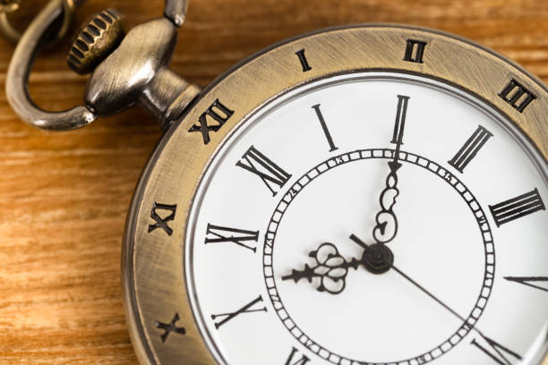 istock Vintage pocket watch clock on wooden background 1143717101