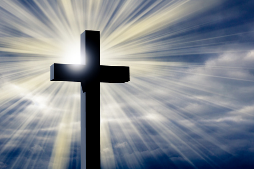 christian cross background with sunlight