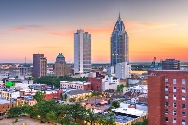 istock Mobile, Alabama, USA downtown skyline at dusk. 1143722373