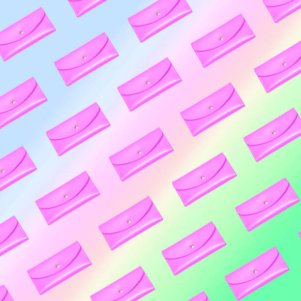 istock flying in the air pink wallets. 1143723259