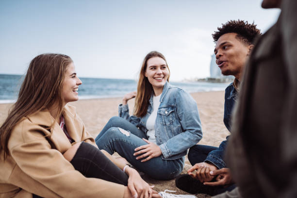 istock friends walking together in Barceloneta 1143723711