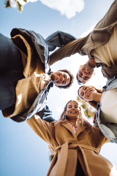 istock friends embracing in Barceloneta 1143724530