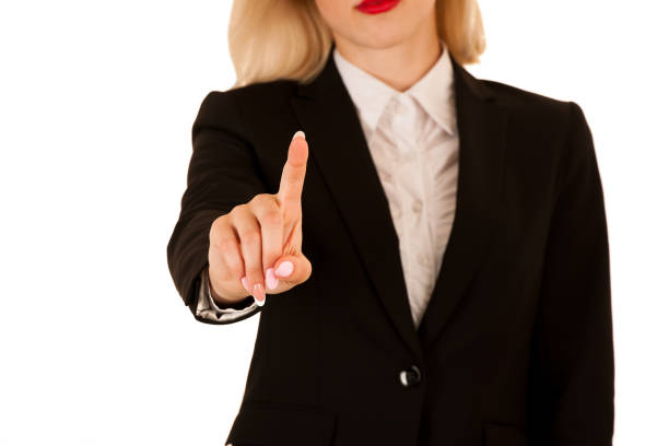 istock attractive business woman pressing a virtual button isolated over white background 1143724574