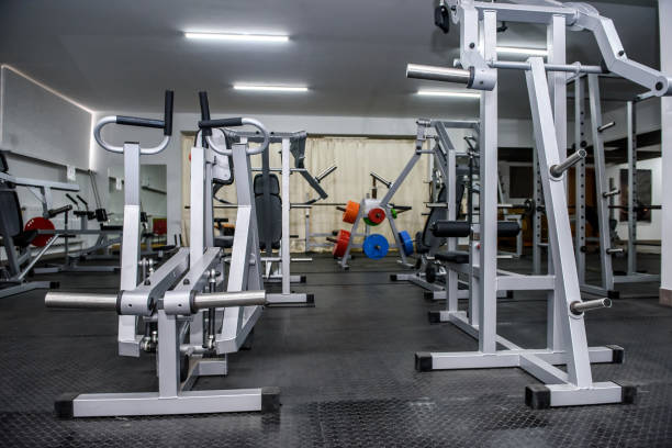 istock Modern interior of light gym with different equipment 1143727250