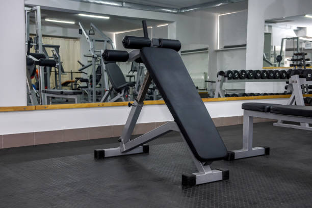 istock Modern interior of light gym with different equipment 1143727420