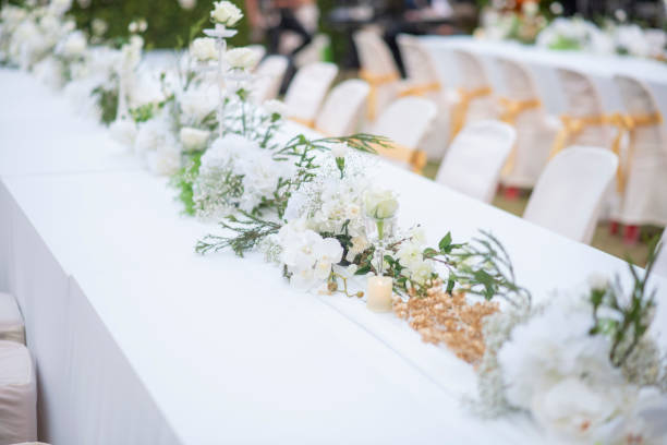 istock White wedding flower background and wedding decoration 1143727467