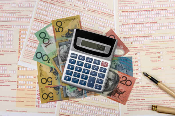 istock Calculator with australian dollars and tax form 1143728277